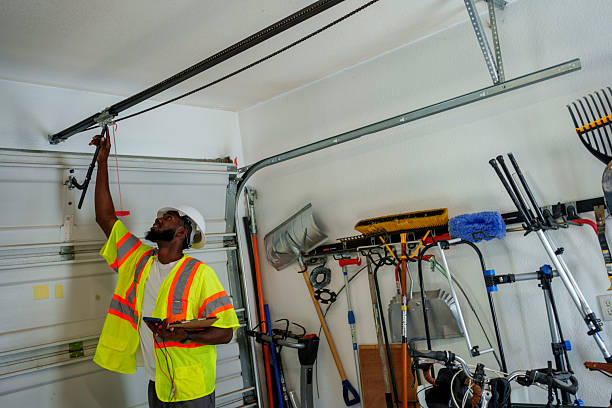 Professional Garage Door Panel Replacement technician working in De Soto, IA